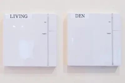 two white calendars with the words living and van at Luxury New House in Tokyo