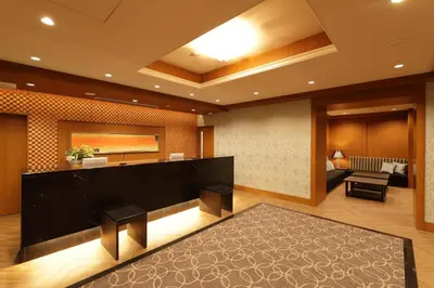 a lobby of a hotel with a reception desk at Hiyori Hotel Maihama in Urayasu