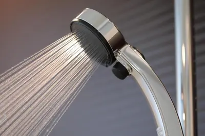 a close up of a shower head on a window at Henn na Hotel Maihama Tokyo Bay in Urayasu