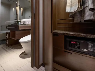 a bathroom with a toilet and a sink at Hotel The Celestine Ginza in Tokyo