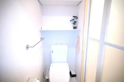 a bathroom with a white toilet in a room at Kiki HouseH --Self Check-in -- Room Number & Password is in the following email in Tokyo