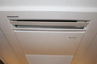 a air conditioner in a room with a ceiling at Hotel Sunroute Stellar Ueno in Tokyo