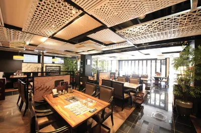 a dining room with tables and chairs in a restaurant at Centurion Hotel&Spa Ueno Station in Tokyo