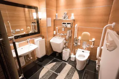a bathroom with a sink and a toilet and a sink at APA Hotel Akihabaraeki-Denkigaiguchi in Tokyo