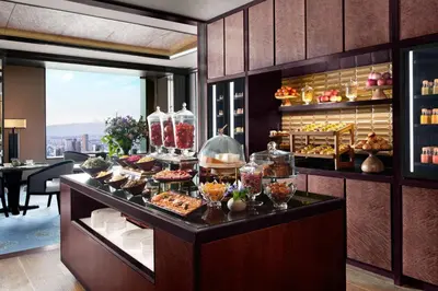 a display case with a bunch of food on it at The Ritz-Carlton, Tokyo in Tokyo