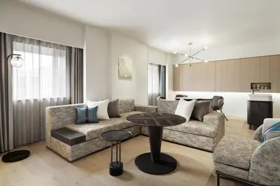 a living room with a couch and a table at Courtyard by Marriott Tokyo Ginza Hotel in Tokyo