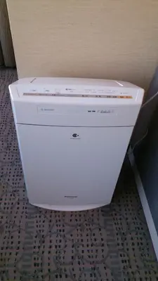 a white printer sitting in the corner of a room at Shibuya Excel Hotel Tokyu in Tokyo