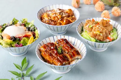 a group of bowls of food on a table at Tokyo Bay Ariake Washington Hotel in Tokyo