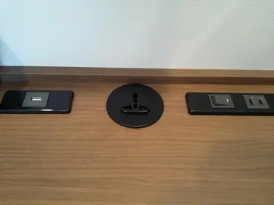 a close up of a desk with two computers on it at the b shimbashi in Tokyo