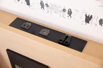 a close up of a control panel on a desk at Shibuya Tokyu REI Hotel in Tokyo