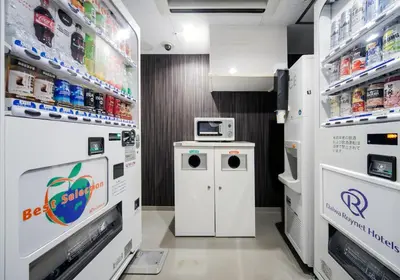 a pharmacy aisle with a machine in a store at Daiwa Roynet Hotel Tokyo Osaki in Tokyo