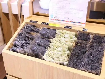 a wooden box filled with different types of cauliflower at Dormy Inn Tokyo Hatchobori - Natural Hot Spring in Tokyo
