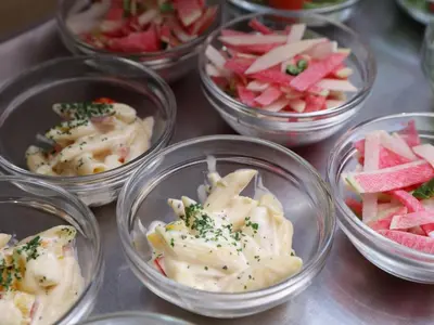a group of glass bowls filled with food on a table at Dormy Inn EXPRESS Asakusa in Tokyo