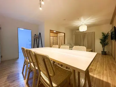 a dining room with a table and chairs at Randor Residence Tokyo Suites in Tokyo