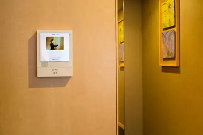 a picture of a person on a wall at The Capitol Hotel Tokyu in Tokyo