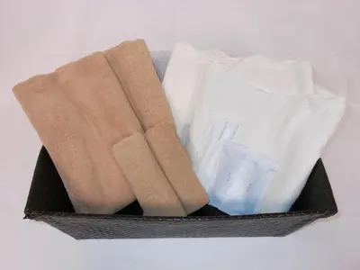 a basket filled with different types of towels at Hotel New Tohoku in Tokyo