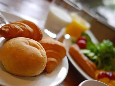 a plate of food with pastries and a salad at HOTEL MYSTAYS Kameido in Tokyo
