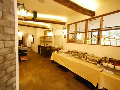 a room with a long table in a kitchen at HOTEL MYSTAYS Kameido in Tokyo
