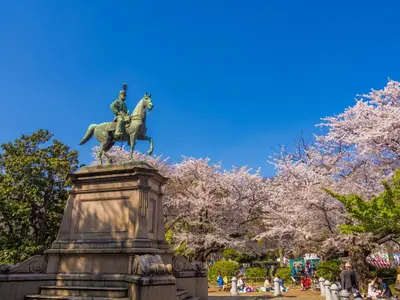 a statue of a man riding a horse in a park at HOTEL MYSTAYS Ueno Inaricho in Tokyo