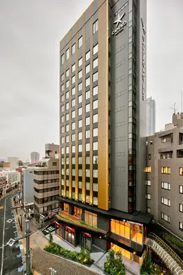 a rendering of a tall building in a city at Candeo Hotels Tokyo Roppongi in Tokyo