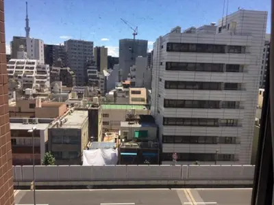 a view of a city with tall buildings at Ueno Urban Hotel in Tokyo