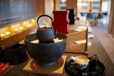 a tea kettle in a bowl on a counter at Keio Plaza Hotel Tokyo Premier Grand in Tokyo