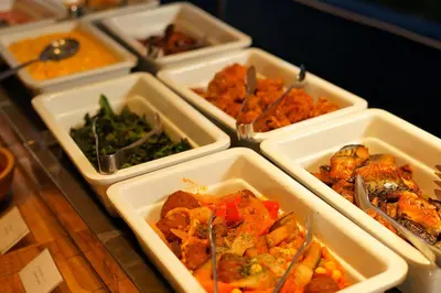 a group of trays filled with different types of food at Sotetsu Fresa Inn Tokyo Roppongi in Tokyo