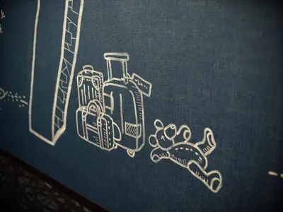 a drawing of luggage and a crab on a book at KOKO HOTEL Ikebukuro East - formerly Hotel Wing International Ikebukuro in Tokyo