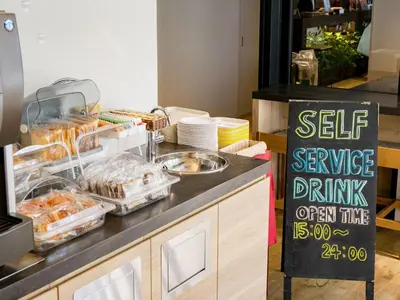 a bakery with a sell sign on a counter at KOKO HOTEL Korakuen - formerly Hotel Wing International Korakuen in Tokyo
