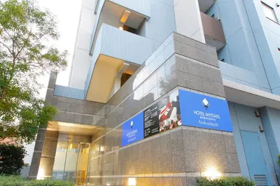 a building with a sign in front of it at HOTEL MYSTAYS Asakusabashi in Tokyo