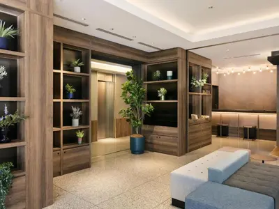 a living room with a couch and potted plants at Tokyu Stay Nishi Shinjuku in Tokyo