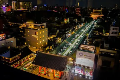 an overhead view of a city at night at Kaminarimon Ryokan in Tokyo