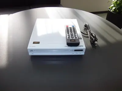 a remote control sitting on top of a box on a table at HOTEL MYSTAYS Asakusa in Tokyo
