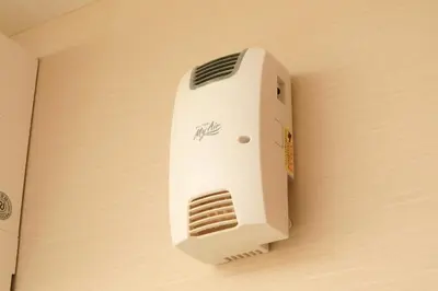 a white wall mounted heater on a wall at Hotel Nihonbashi Saibo in Tokyo
