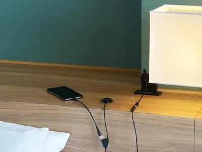 a video game controller on the floor of a room at Mitsui Garden Hotel Ueno in Tokyo