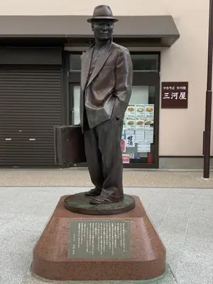a statue of a man in a suit and hat at Sky Heart Hotel Koiwa in Tokyo