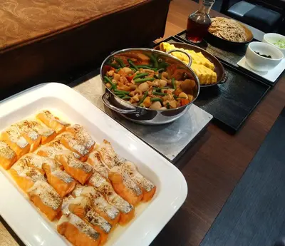 a table with a tray of food and a bowl of food at Hotel Grand City in Tokyo