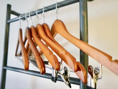 a bunch of utensils hanging on a rack at Henn na Hotel Tokyo Ginza in Tokyo