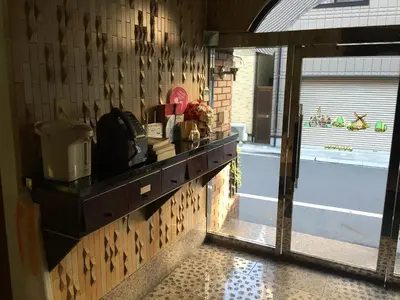 a counter in a room with a window and a counter sidx sidx at Asakusa Hotel Fukudaya in Tokyo