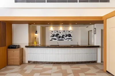 a restaurant with a counter in a room at Tokyu Stay Nihonbashi in Tokyo