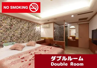 a hotel room with a bed and a no smoking double room at Restay Frontier (Adult Only) in Tokyo