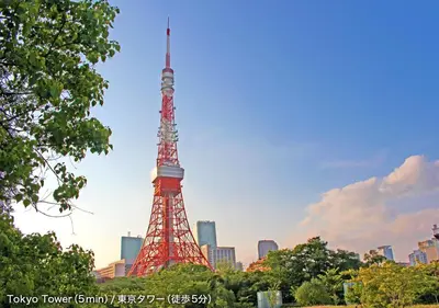 a view of the tokyo tower from a park at Tokyo Tower View Guest House in Tokyo