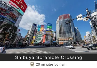 a busy city street with buildings and a crosswalk at Tokyu Stay Yoga in Tokyo