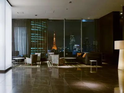a hotel lobby with a view of the eiffel tower at Mitsui Garden Hotel Ginza Premier in Tokyo
