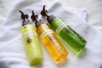 three bottles of wine on a white towel at HOTEL MYSTAYS Kanda in Tokyo