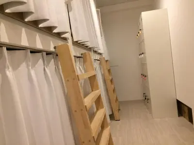 a row of stairs in a room at bnb+ Akihabara (Female Only) in Tokyo