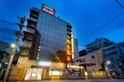 a building with a sign on top of it at Hotel Crest Kinshicho (Adult Only) in Tokyo