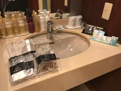 a bathroom sink with a faucet and a counter top at Hotel Crest Kinshicho (Adult Only) in Tokyo