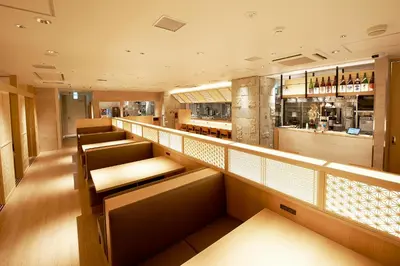 a restaurant with empty seats and a bar at Sotetsu Fresa Inn Tokyo Kinshicho in Tokyo