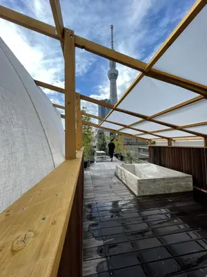 a view of the eiffel tower from the roof of a building at AET & o3 HOTEL in Tokyo